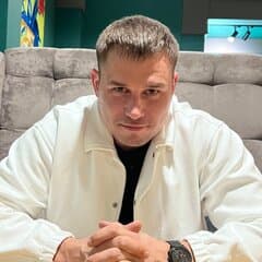 Роман Белов